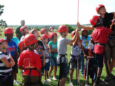 group of students with helmets to climb